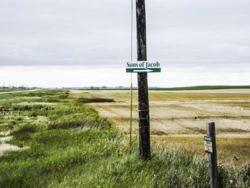 directional sign on pole